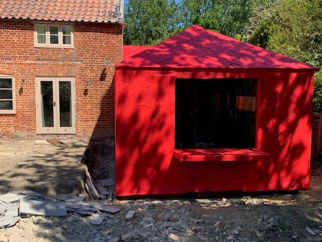 Ground screws installed for extension in Surrey.